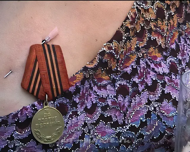 The Medal, 2003, documentation of performance, Berlin,