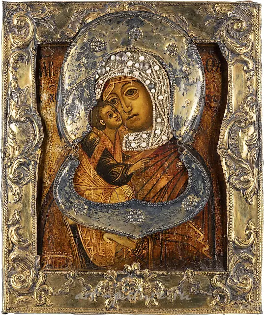 AN ICON SHOWING THE DONSKAYA MOTHER OF GOD WITH A SILVER