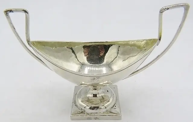 A Russian silver two handled boat shaped pedestal salt, approximately...