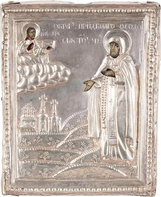 A SMALL ICON SHOWING ST. FEODOSIY OF TOTEMSK WITH A SILVER