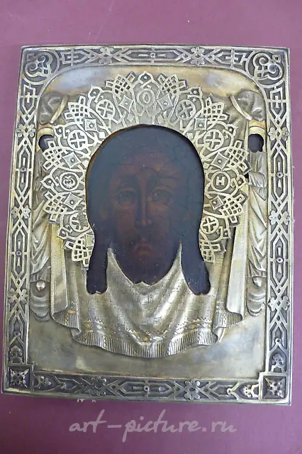 19th century chased cast iron wall cabinet decoration of a woman's silhouette.