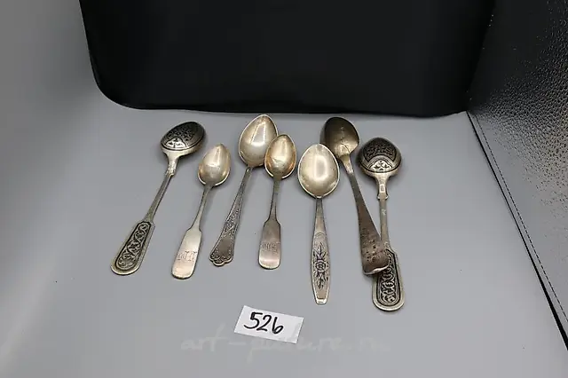 800 silver ladle, six coffee spoons and four teaspoons, total...
