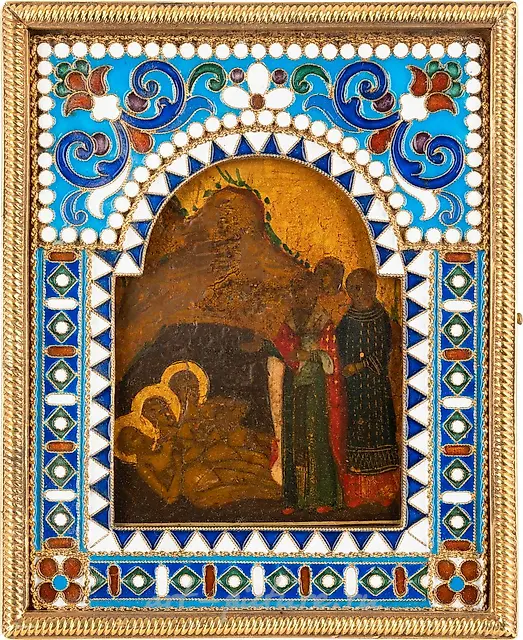 A SMALL ICON SHOWING ST. NICHOLAS OF MYRA WITH A SILVER-GIL