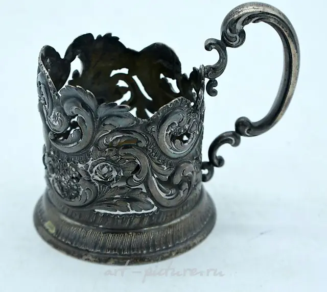 AN ANTIQUE RUSSIAN SILVER AND GLASS CUP HOLDER. Silver 191 g...