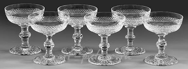 Sentence about the six Saint-Louis Champagne glasses "Trianon":

The sentence refers to a set of six exquisite Champagne glasses from the renowned glass manufacturer Saint-Louis, known as "Trianon".