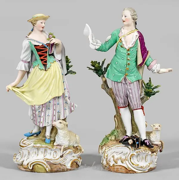 A pair of shepherd figurines as counterparts.