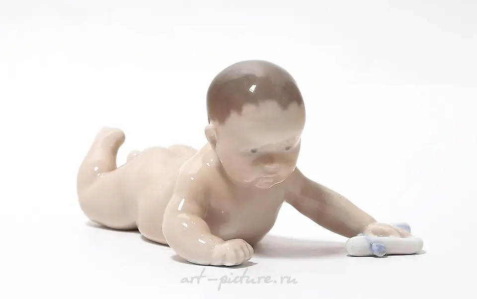 Crawling baby. Denmark, Copenhagen, Royal Copenhagen