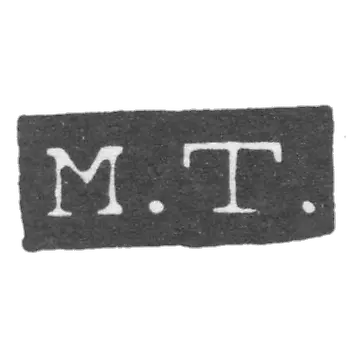 "M.T."