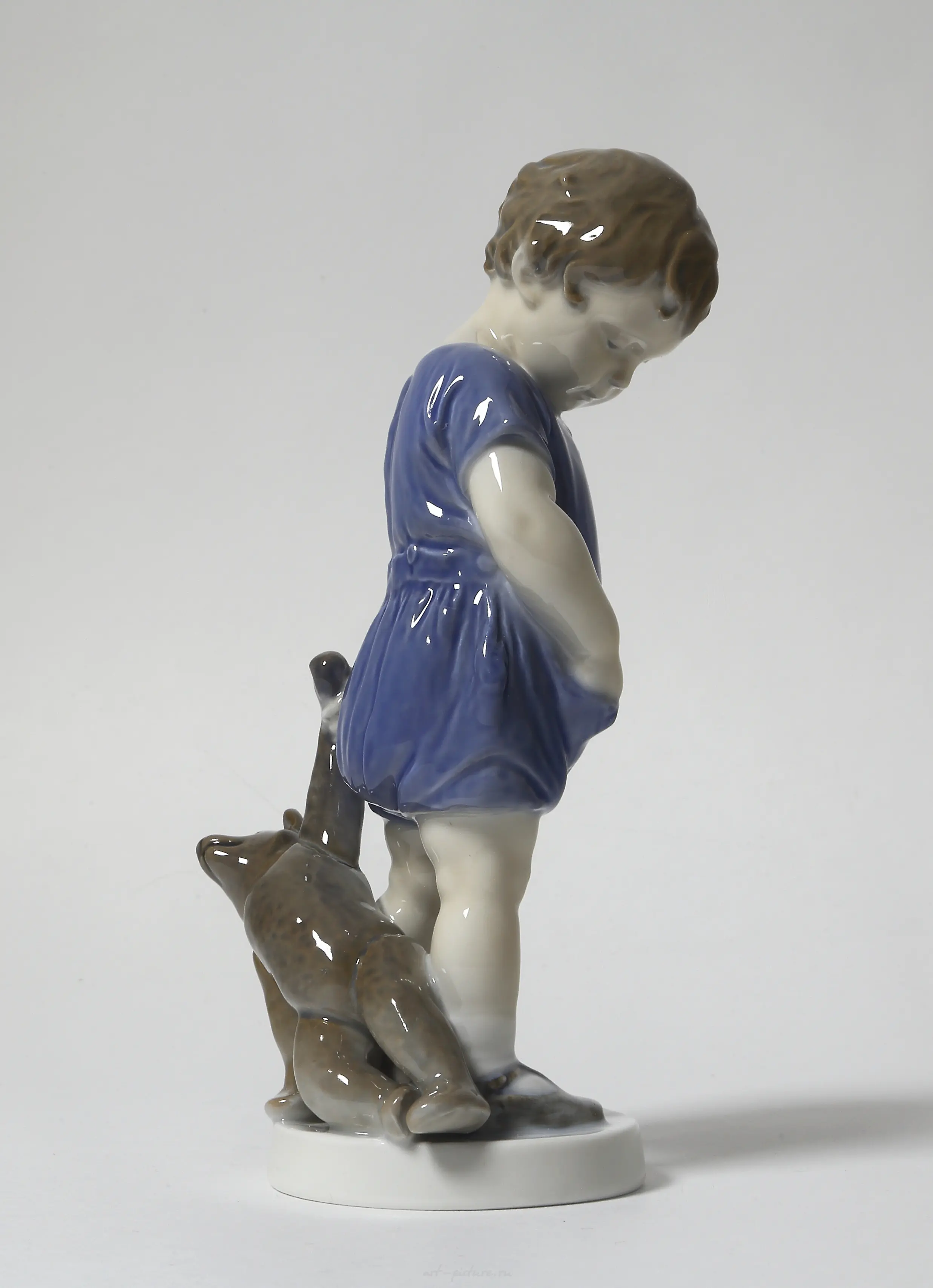Boy with a teddy bear. Denmark, Copenhagen, Royal Copenhagen. — photo 4
