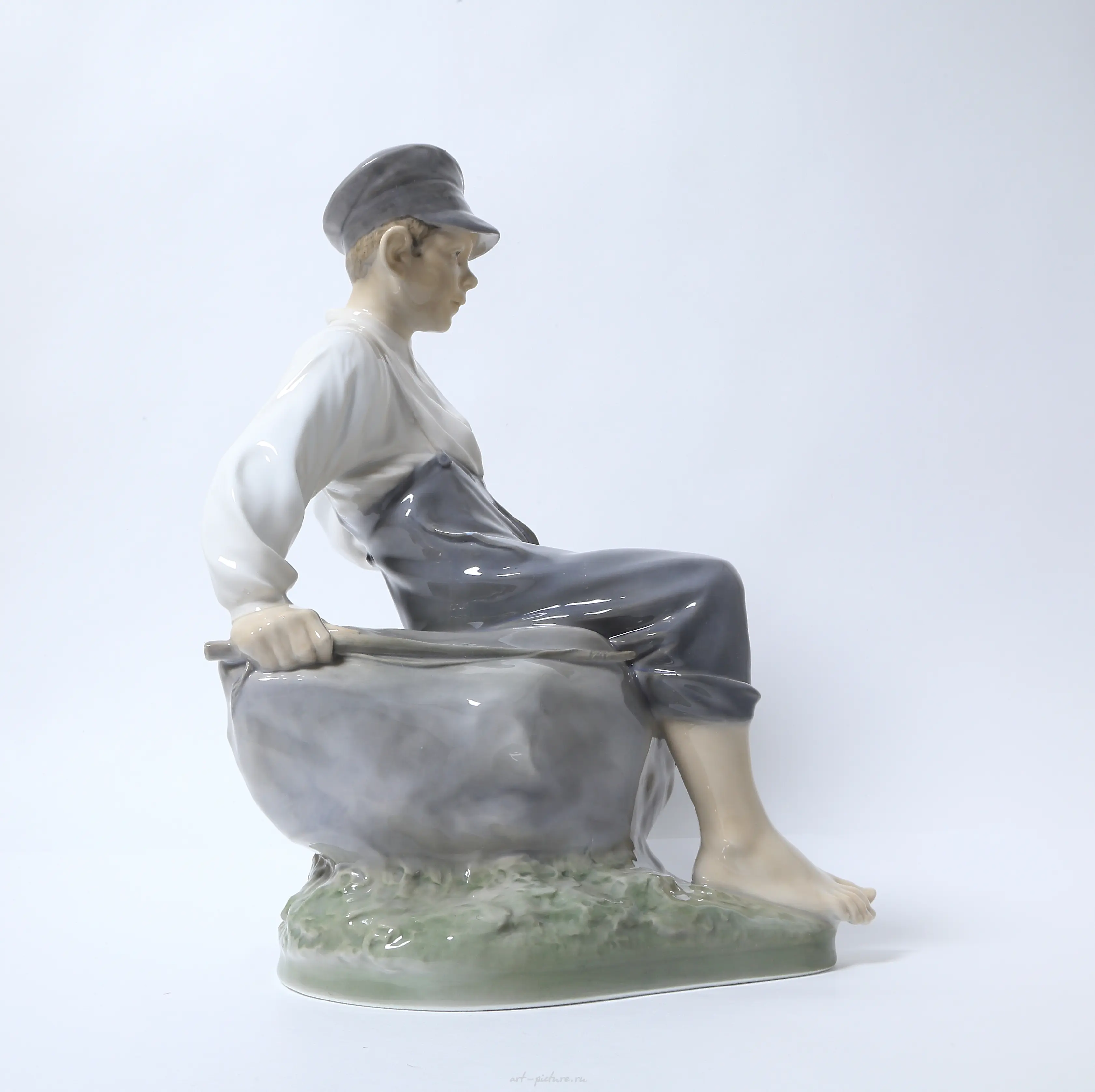 "Boy on a stone. Denmark, Copenhagen, Royal Copenhagen." — photo 4