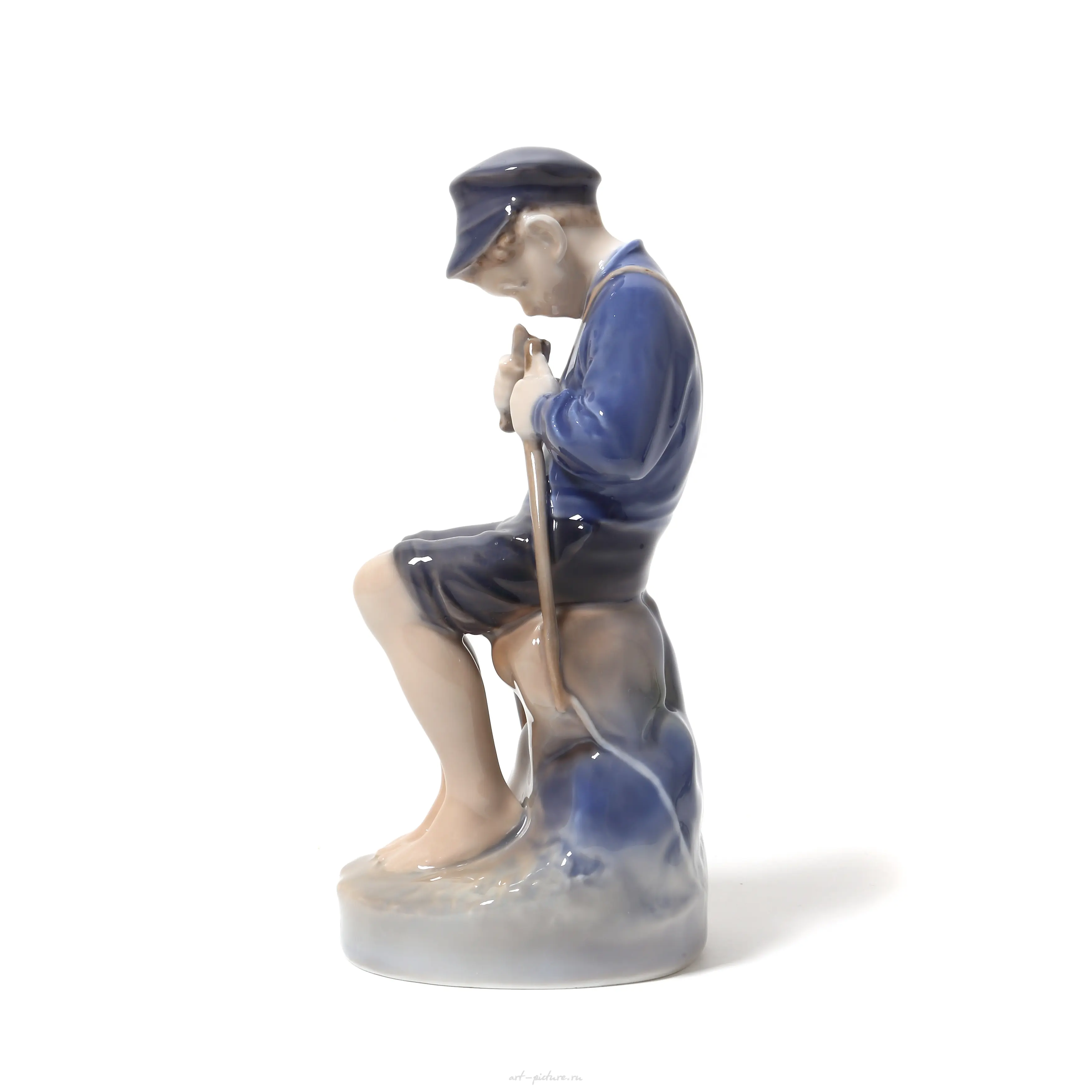 Boy carving a twig. Denmark, Copenhagen, Royal Copenhagen. — photo 4