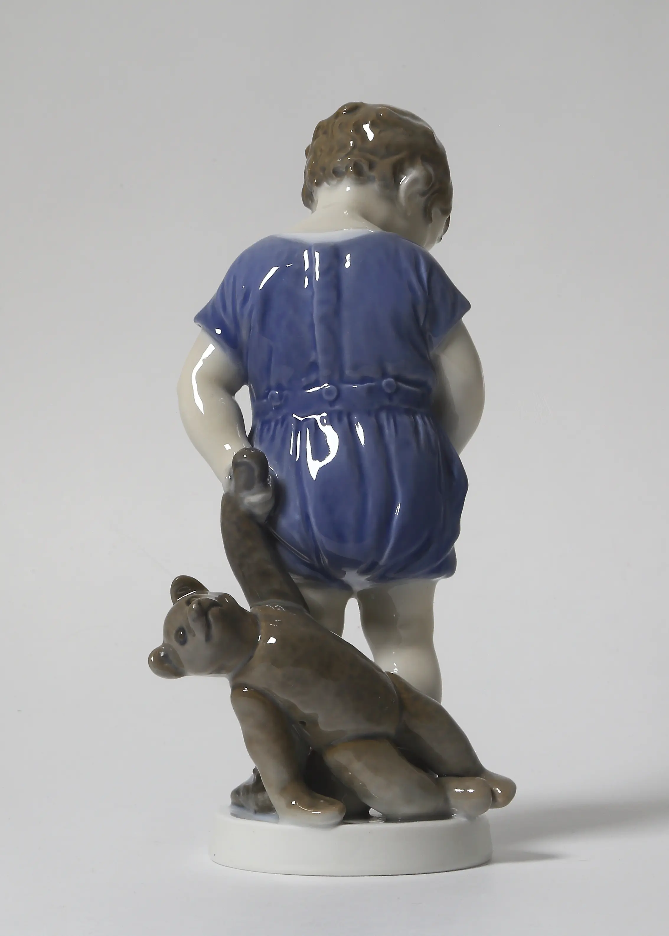 Boy with a teddy bear. Denmark, Copenhagen, Royal Copenhagen. — photo 5