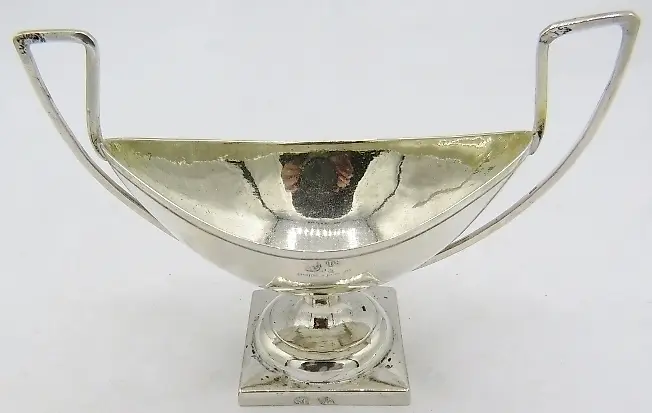 A Russian silver two handled boat shaped pedestal salt, approximately...