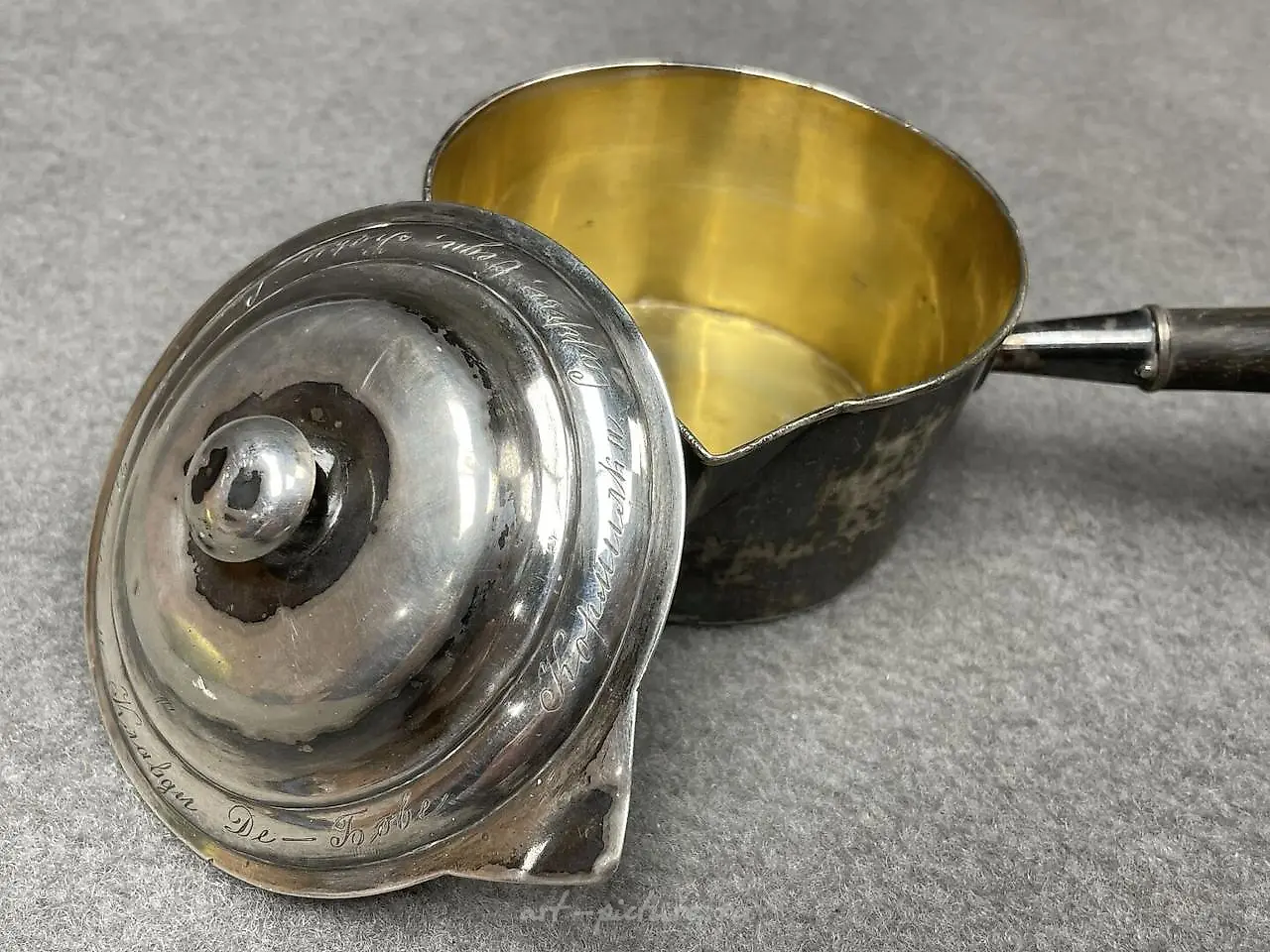Silver ladle with a wooden handle that has been blackened. Marks... — photo 7