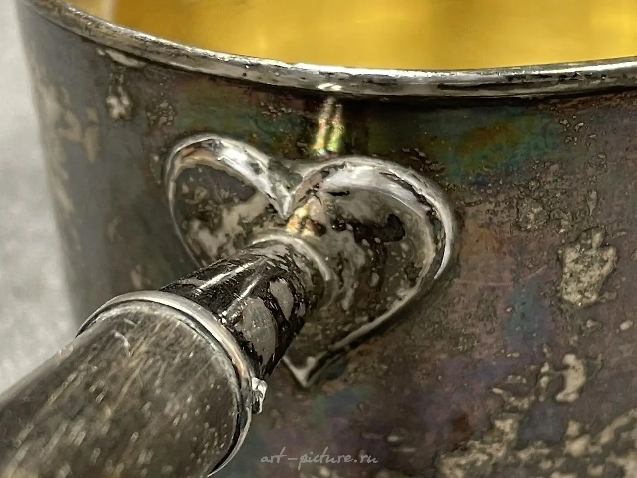 Silver ladle with a wooden handle that has been blackened. Marks... — photo 10