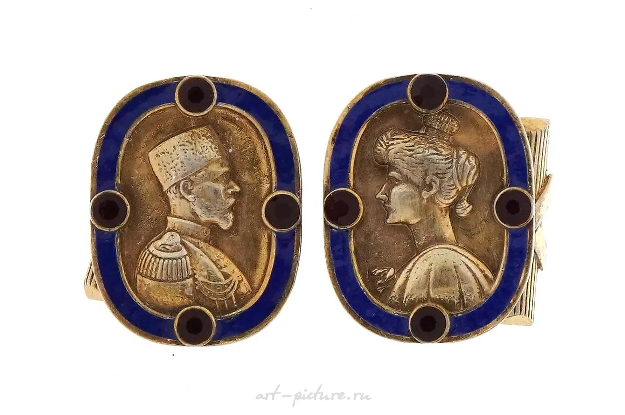 Pair of silver gilt and enamel portrait cufflinks set with rubies.