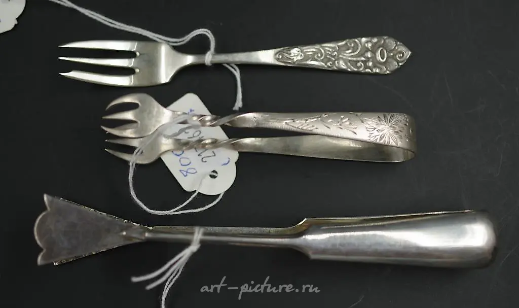 Pair of George IV sterling silver sugar tongs