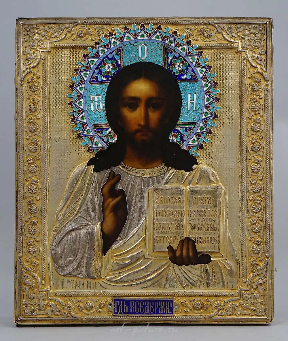A RUSSIAN GILT-SILVER OKLAD ICON OF CHRIST PANTOCRATOR, 19TH...