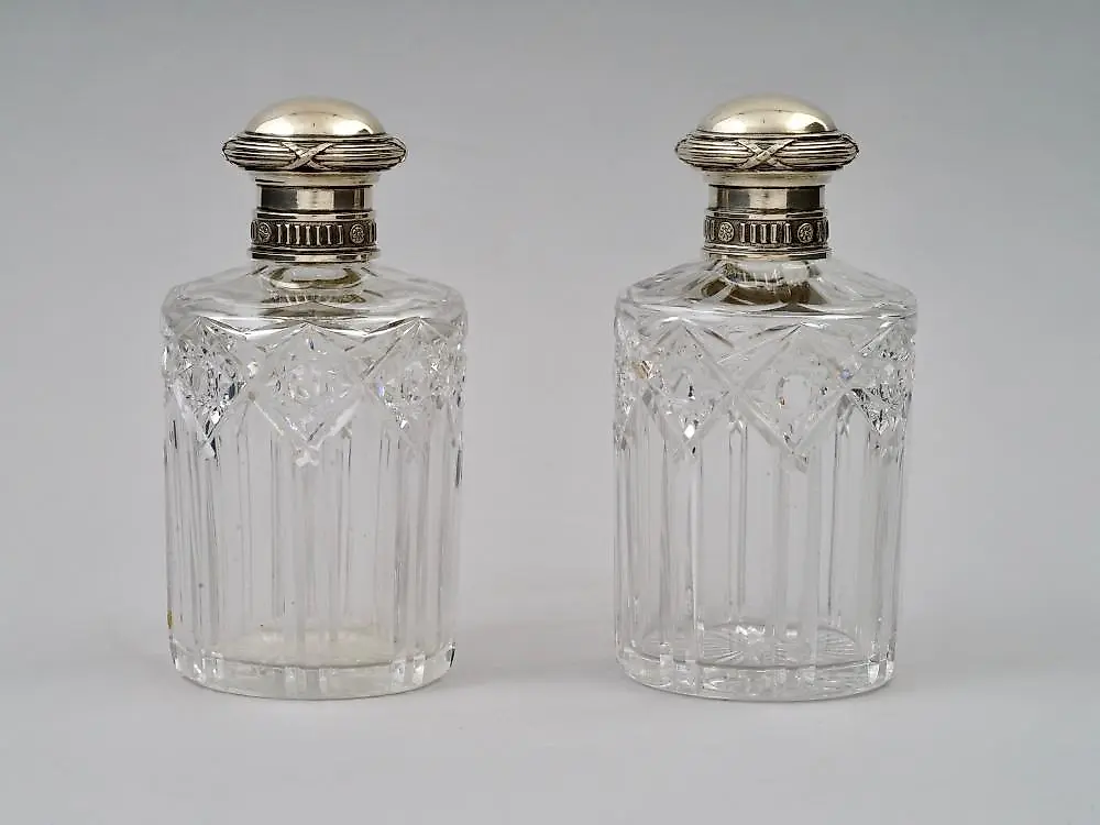 A RUSSIAN FABERGE SILVER-MOUNTED CUT-GLASS TOILETTE SET