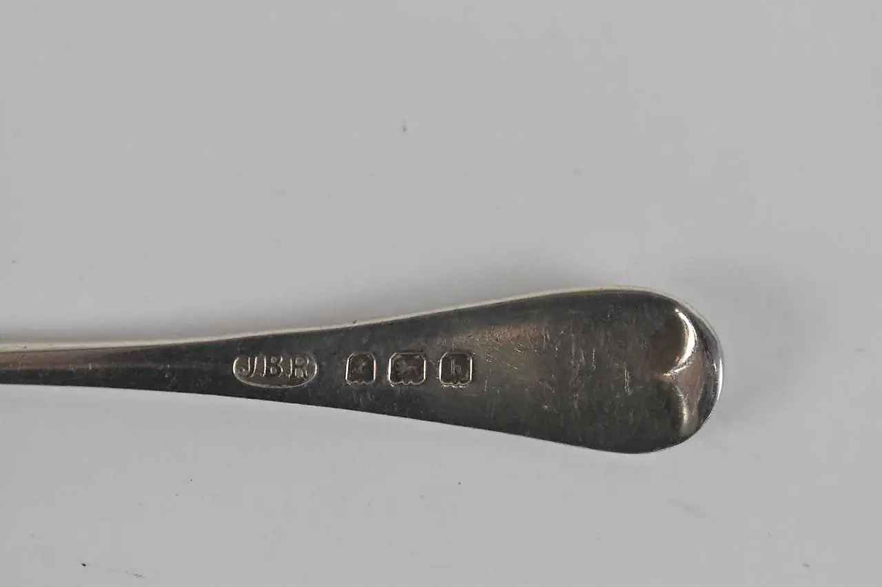 Four assorted hallmarked silver spoons, together with a pair... — photo 2