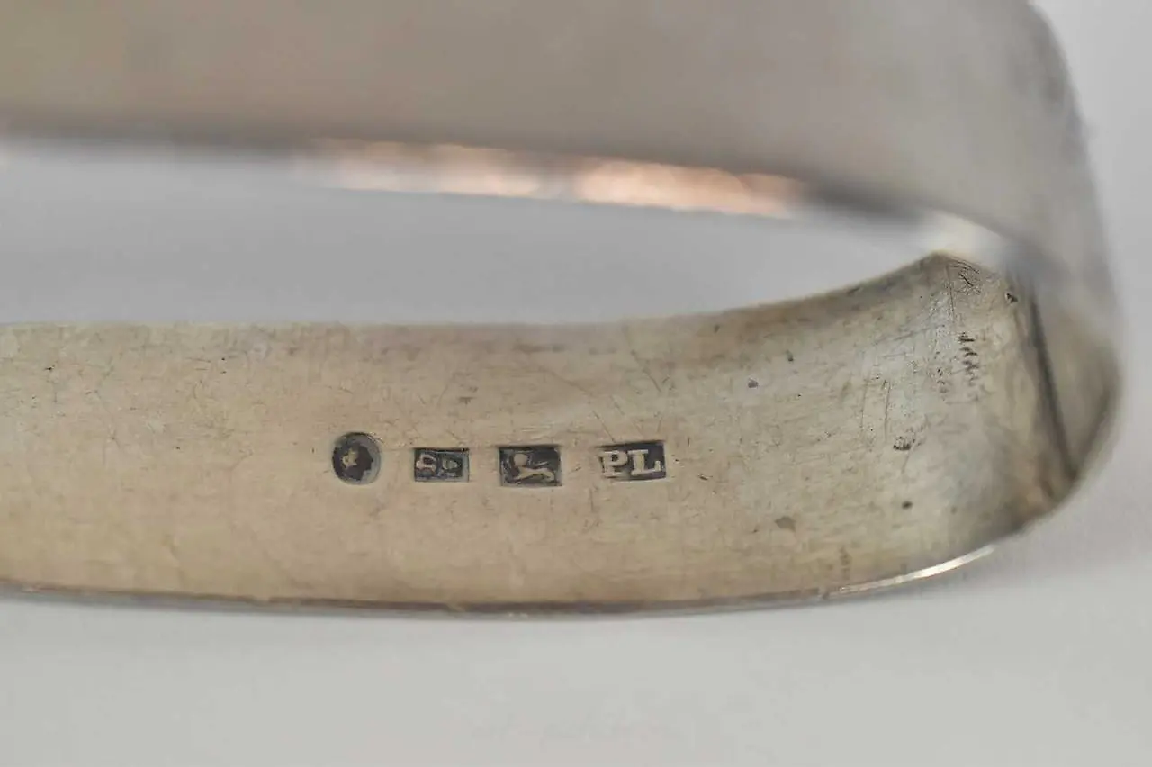 Four assorted hallmarked silver spoons, together with a pair... — photo 3