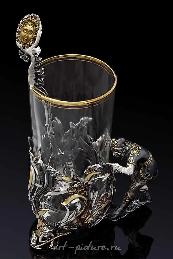 The translation of "Серебряный подстаканник Иван-царевич" into English is "Silver cup holder Ivan Tsarevich."