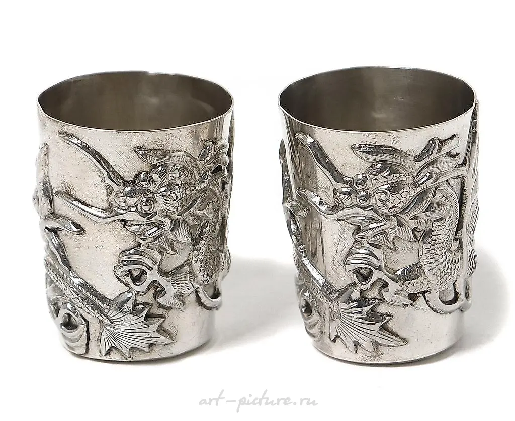 Silver cups with dragons, 2 pcs. China, late 19th - early 20th century.