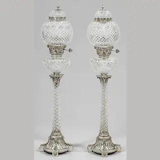 A couple of large, decorative table lamps in the Empire style.