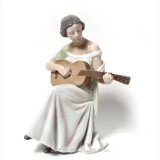 The girl with a guitar.
