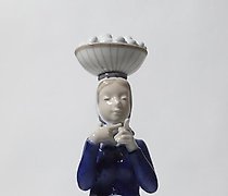 Статуэтка A woman with a basket of…