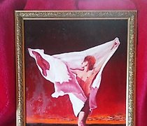 Статуэтка The text "Пламя Масло" t…