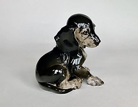 The translation of the text is: "Figurine 'Young Dachshund' Rosenthal Germany 1936."