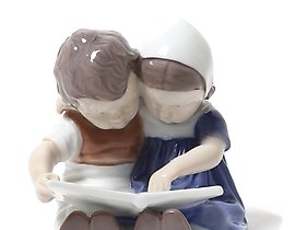 "Children reading a book. Denmark, Copenhagen, Bing & Grondahl."