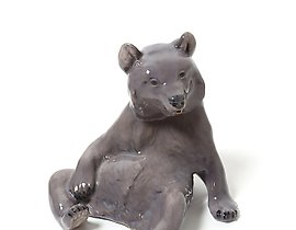 The translation of "Медведь" into English is "Bear."