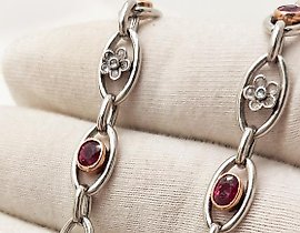 Here is the translation of your text into Simplified Chinese:

铂金黄金镶钻石红宝石手链 50年代