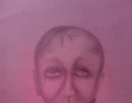 The translation of the text "Портрет тонированная бумага,карандаш" into English is "Portrait on toned paper, pencil."