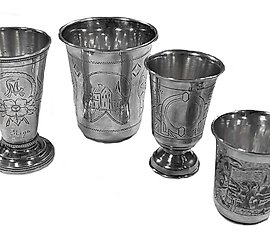 Four Russian metalwares silver vodka tumblers.