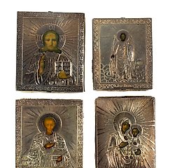 A (lot of 4) Russian miniature .84 silver oklad traveling icons.