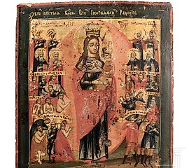 A Russian icon showing St. Nicholas of Myra with silver okla...