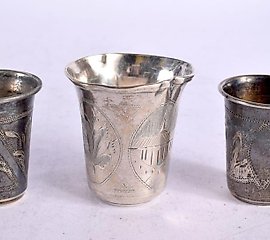 三个银酒杯