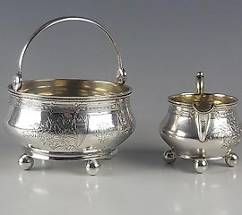 19th century antique silver sugar bowl and creamer of Russian production.