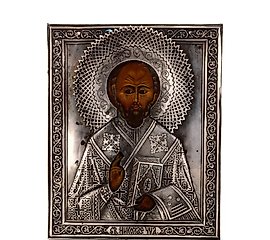 A LATE 19TH CENTURY SILVER-MOUNTED RUSSIAN ICON