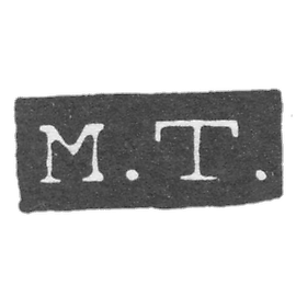 "M.T."