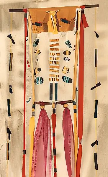Without a title, 1989, cardboard, textile, wood, stone (ocher), 155x45 Author`s property