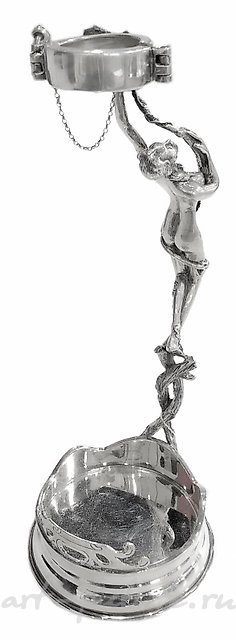 Bottle holder for wine made of silver.