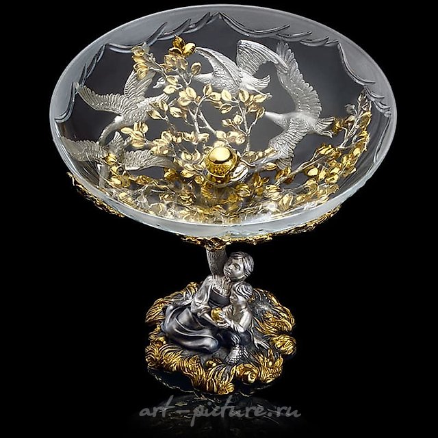 The translation of "Ваза «Гуси-Лебеди»" into English is "Vase 'Geese-Swans'."