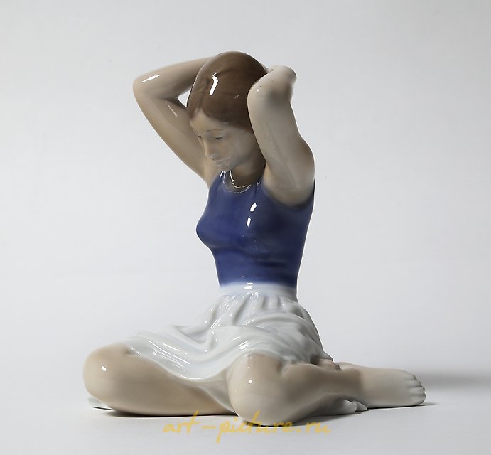 "Girl adjusting her hair. Denmark, Copenhagen, Royal Copenhagen."