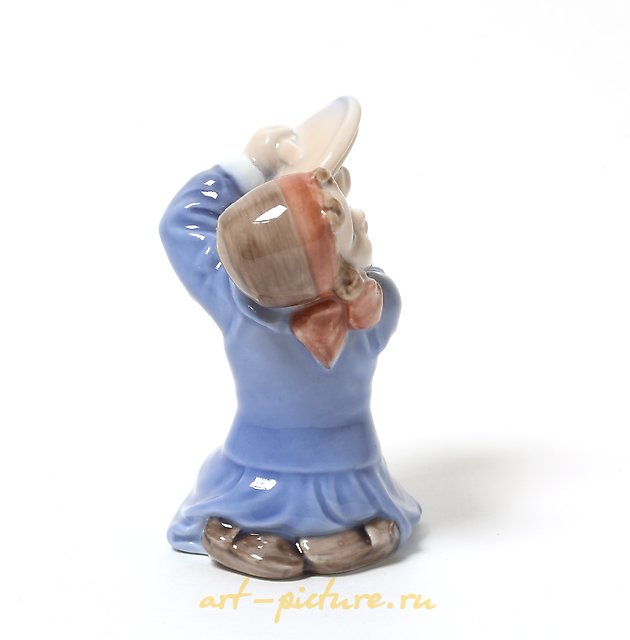 The girl with the plates. Denmark, Copenhagen, Royal Copenhagen.