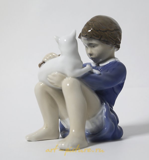 女孩与猫。丹麦，哥本哈根，皇家哥本哈根