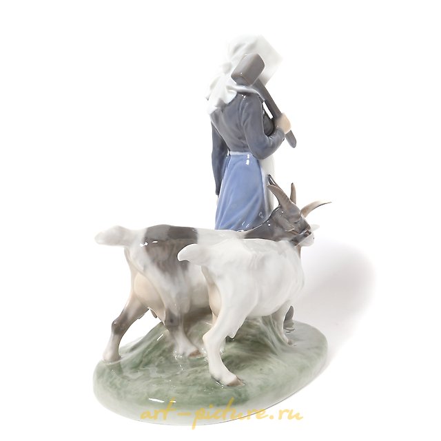 The translation of "Девушка с козами Royal Copenhagen" into English is "Girl with Goats Royal Copenhagen."